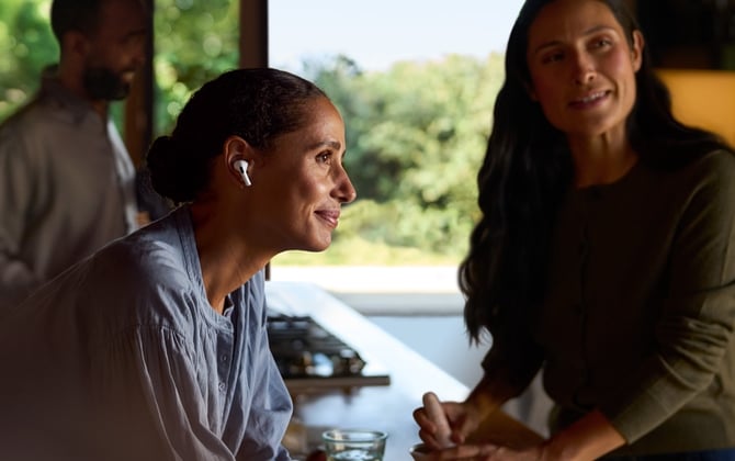 A woman wearing AirPods Pro 2