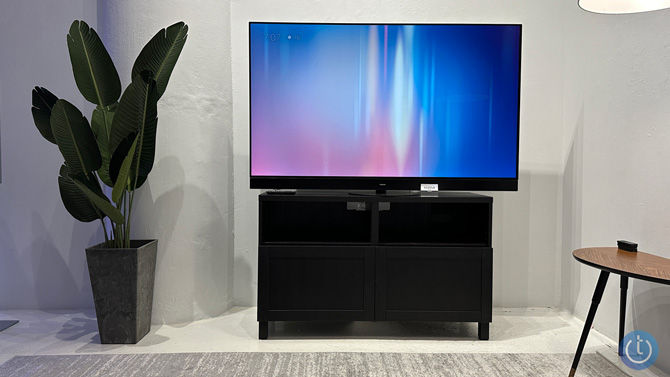 Panasonic Z95A OLED TV is shown on a TV stand.