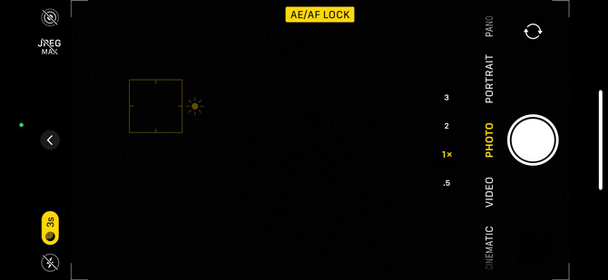 iOS Camera app screenshot showing AE/AF lock label in a yellow box and a yellow-box outline showing the locked area on a black screen