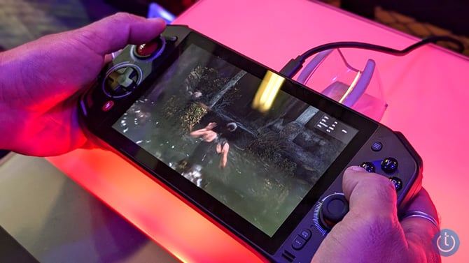 Acer Nitro Blaze 7 is shown handheld from the front.