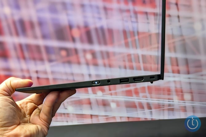 The ThinkPad X1 Carbon Gen 13 Aura Edition is shown from the side.