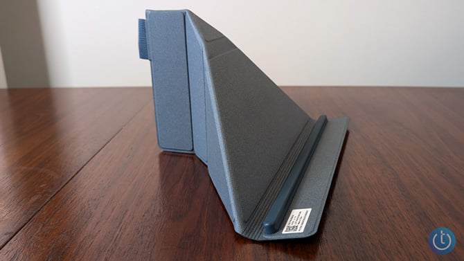 The Lenovo Yoga Book 9i stand is shown from the side.