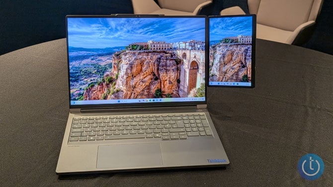 ThinkBook Magic Bay Display concept, a modular, attachable 8-inch secondary screen that snaps onto the back of a ThinkBook laptop 