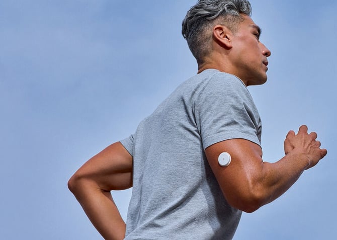 Abbott Labs Lingo sensor on the arm of a runner.