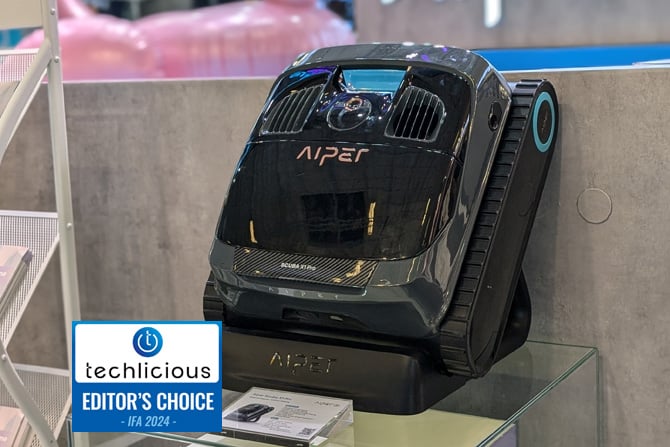  The Aiper Scuba X1 Pro is shown on a table. The Techlicious Editor's Choice Award logo is in the lower left.