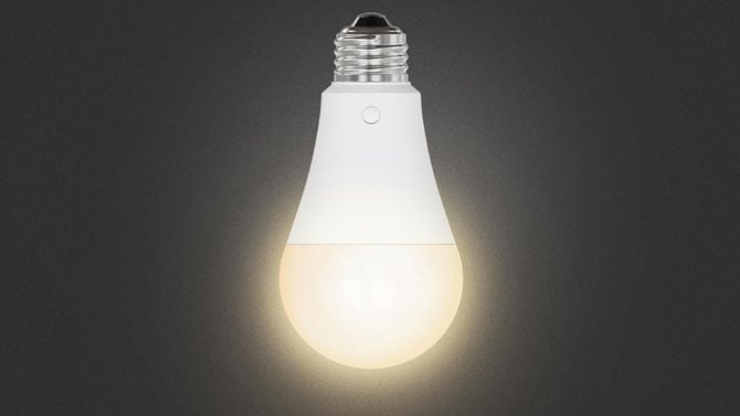 A Feit Eletric Adjustable White Rechargeable LED Bulb is shown glowing on its own.