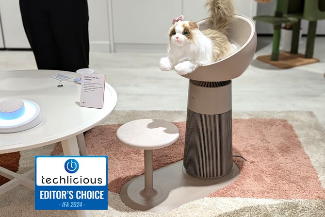  The LG PuriCare is shown with a stuffed cat in the seat on top. The Techlicious Editor's Choice Award logo is in the lower left.