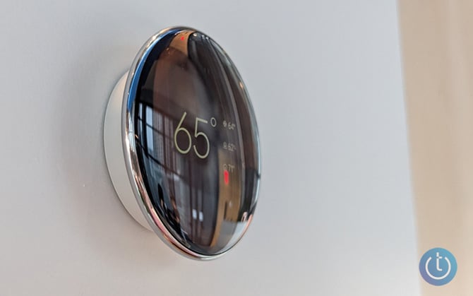 Google Nest Learning Thermostat 4th Gen is shown from the side.