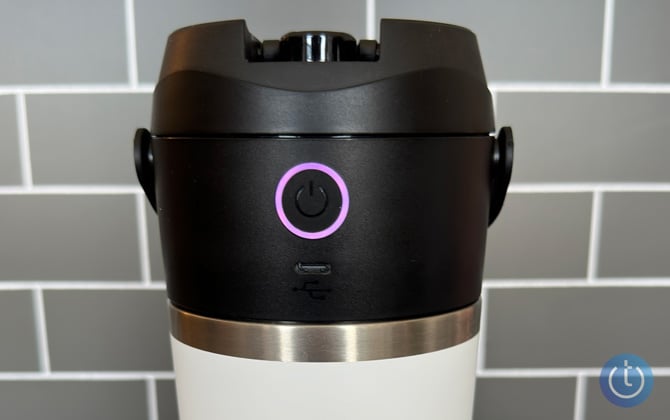 Nutribullet Flip with the ring around the start button glowing purple.