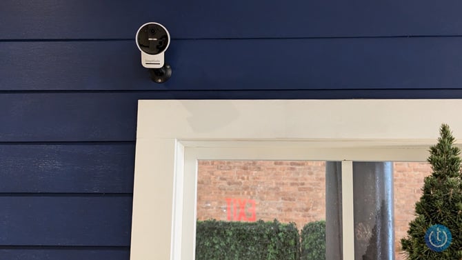 SimpliSafe Outdoor Camera 2 shown mounted outside of a home.