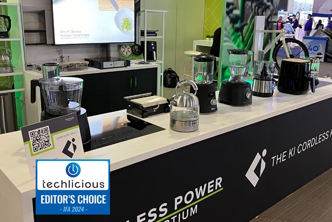  The Wireless Power Consortium's booth showing various Ki wireless small appliances. The Techlicious Editor's Choice Award logo is in the lower left.