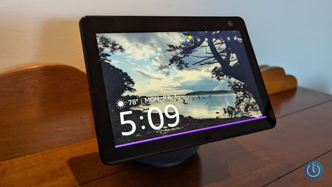 Amazon Echo 10 is shown with a picture and a purple bar on the bottom signifiying that whisper mode is on.