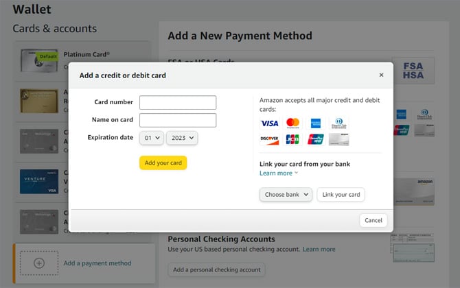 Amazon website showing a popup with the option to add a credit or debit card.