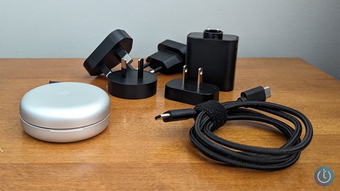 Twelve South ButterFly shown with its accessories: the power adapter, four plug adapters, and USB-C cable 