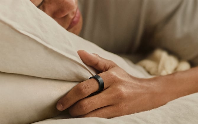 Samsung Galaxy Ring worn by a sleeping figure